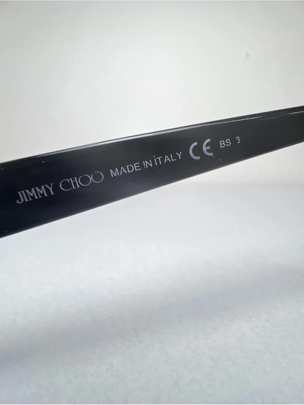 Jimmy Choo Black Frame Sunglasses with Blue Lenses